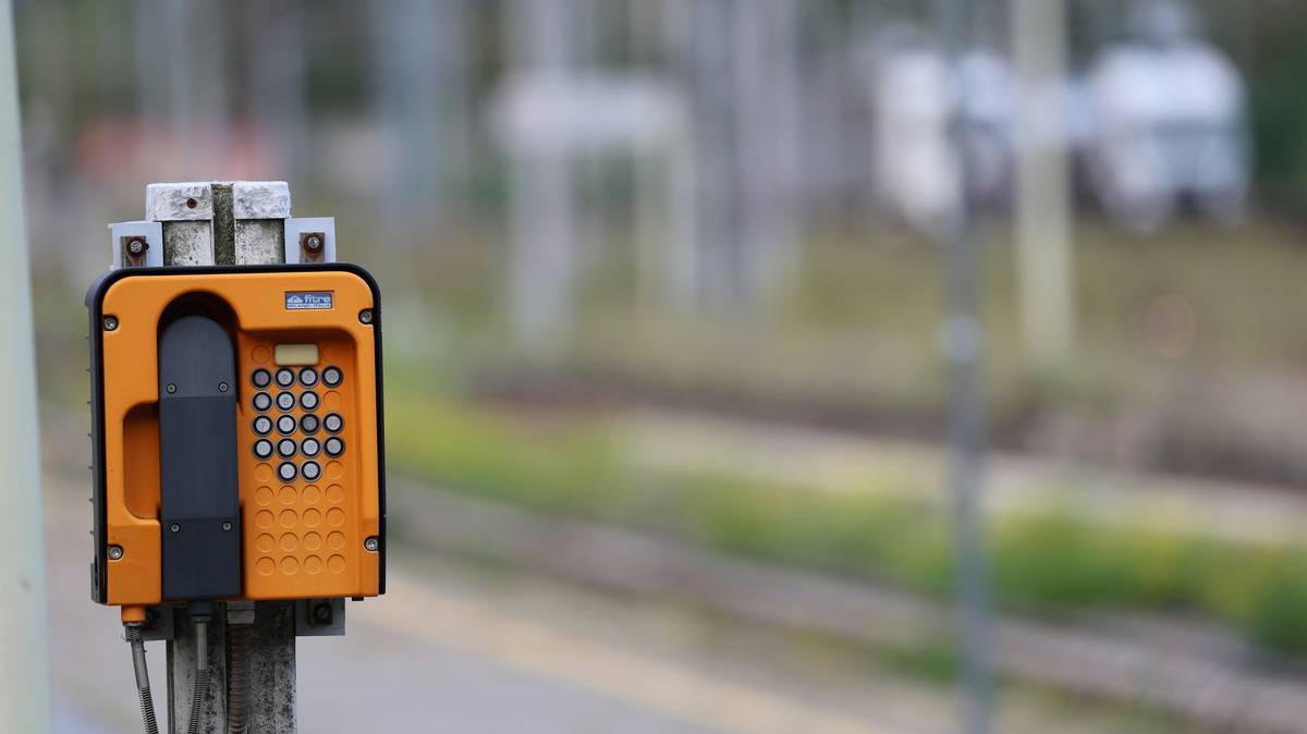 Photo of a professional negotiator speaking into a headset
