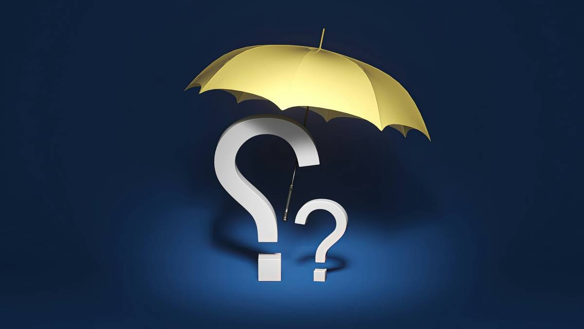 Executive reviewing crisi response kidnap ransom disaster management coverage options with risk analyst