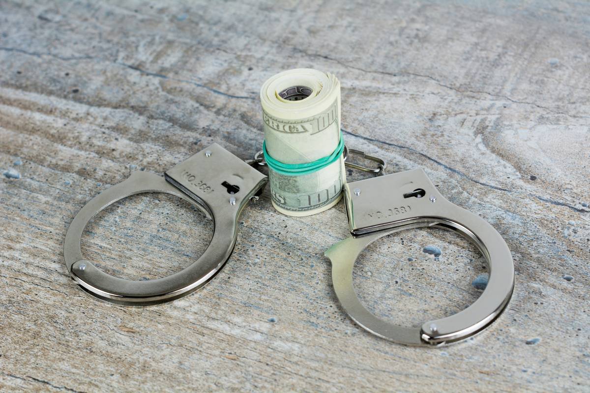 credit kidnap ransom insurance tactics illustrated with secure credit transfer during hostage situation